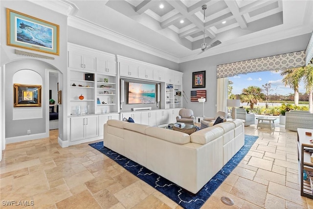 living room with a towering ceiling, coffered ceiling, ceiling fan, crown molding, and beamed ceiling