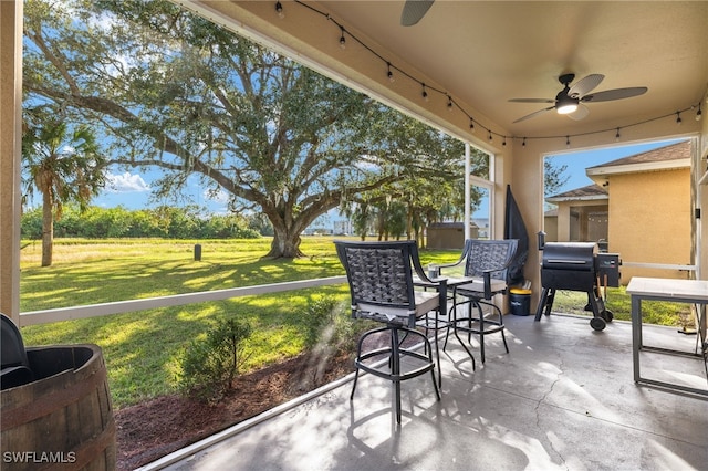 321 Shadow Lakes Dr, Lehigh Acres, FL 33974 - view of patio / terrace with grilling area and ceiling fan