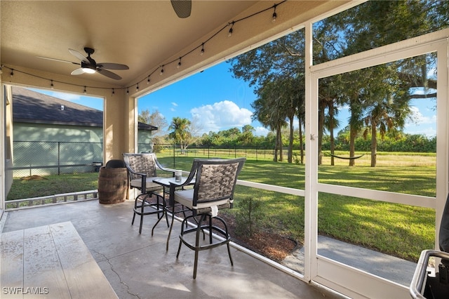 321 Shadow Lakes Dr, Lehigh Acres, FL 33974 - sunroom / solarium with a ceiling fan