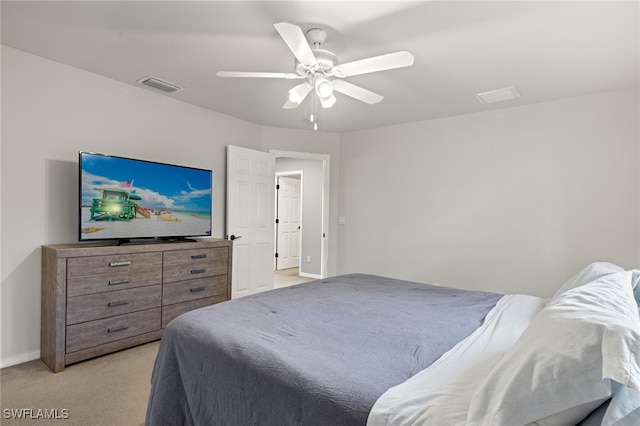 321 Shadow Lakes Dr, Lehigh Acres, FL 33974 - bedroom featuring baseboards, a ceiling fan, visible vents, and light colored carpet