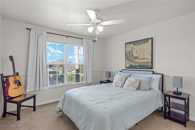 321 Shadow Lakes Dr, Lehigh Acres, FL 33974 - bedroom with a ceiling fan, baseboards, and light carpet