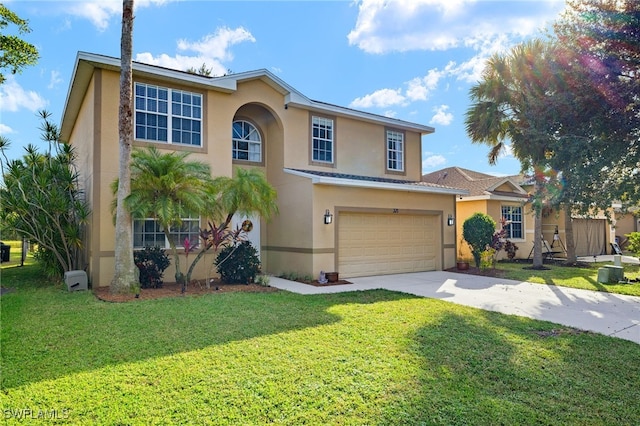 view of front of house featuring a garage and a front lawn