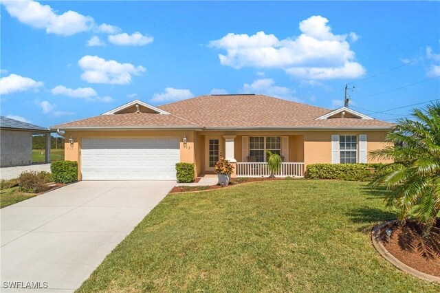 ranch-style house with covered porch, a garage, and a front yard