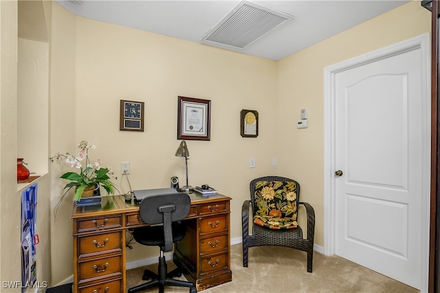 office area featuring light colored carpet