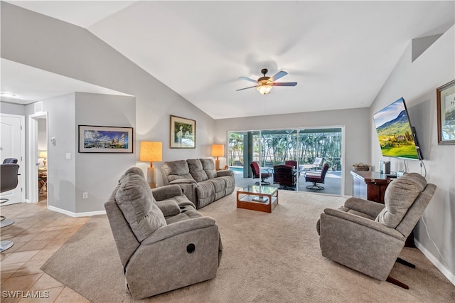 tiled living room with ceiling fan and vaulted ceiling