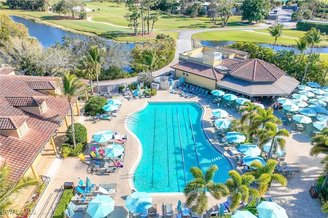 view of pool featuring a water view