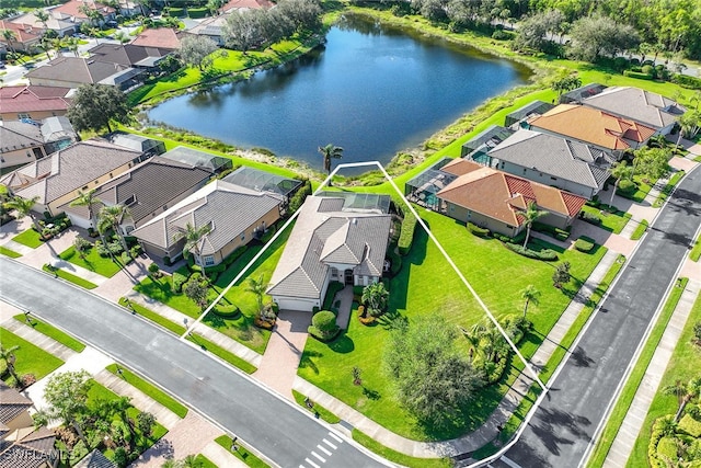 drone / aerial view featuring a water view