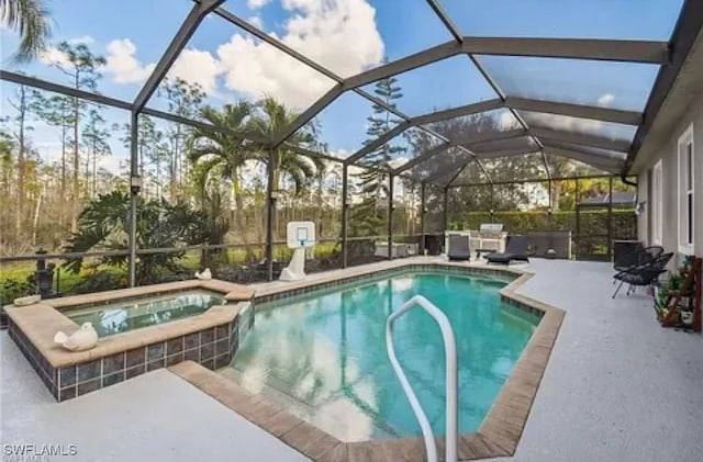 view of swimming pool with an in ground hot tub, a patio, and glass enclosure