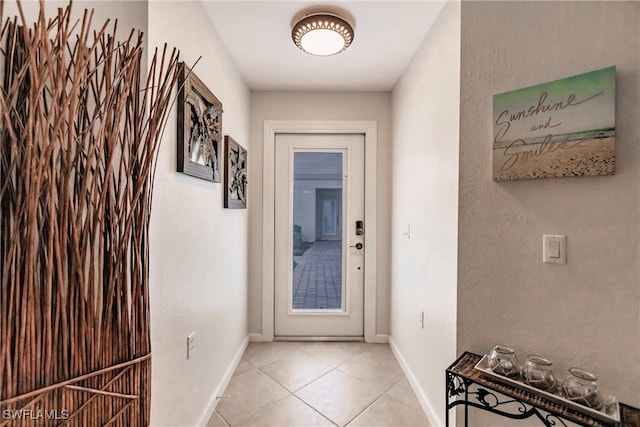 doorway featuring light tile patterned floors