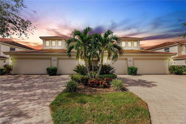 view of front of property featuring a garage