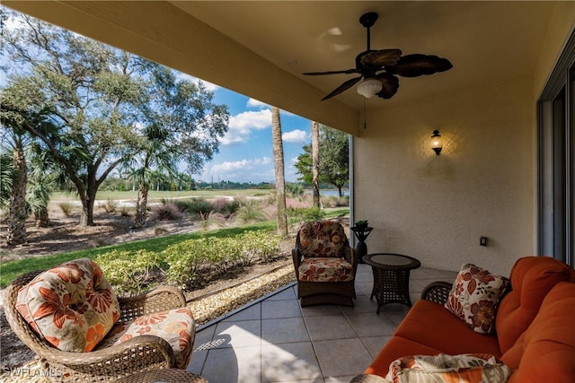 view of patio featuring ceiling fan and outdoor lounge area