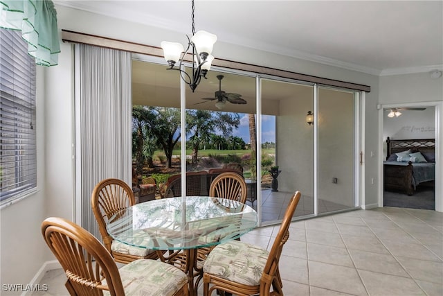 tiled dining room with an inviting chandelier and ornamental molding