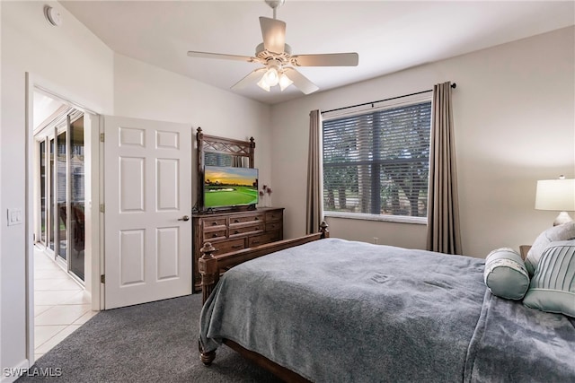 tiled bedroom with ceiling fan