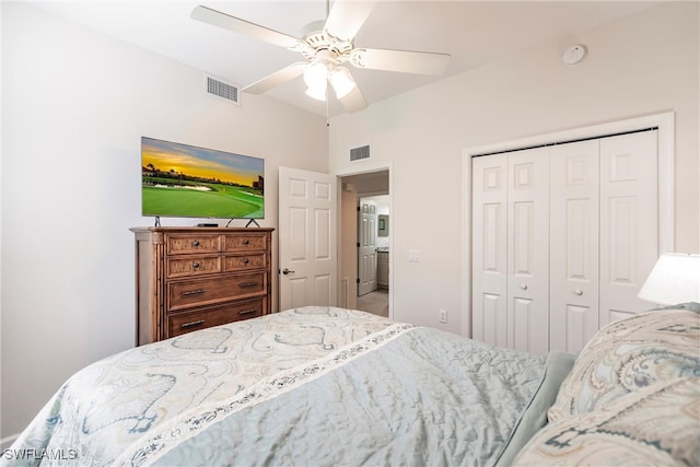 bedroom with ceiling fan and a closet