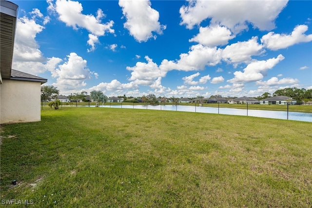 view of yard with a water view