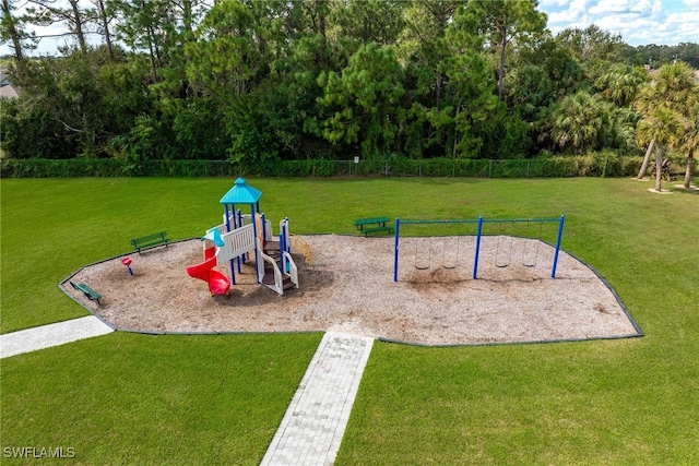 view of playground featuring a yard