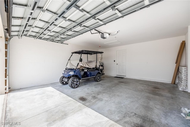 garage featuring a garage door opener