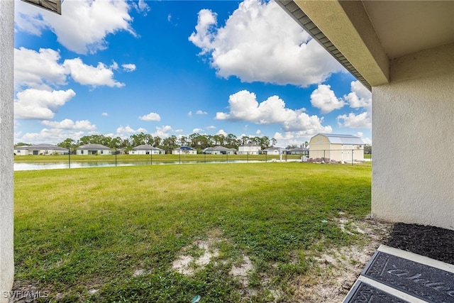 view of yard featuring a water view