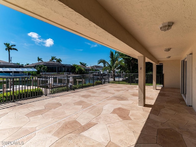 view of patio / terrace with a water view