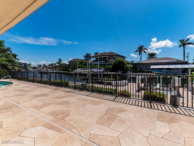 view of patio / terrace featuring a water view