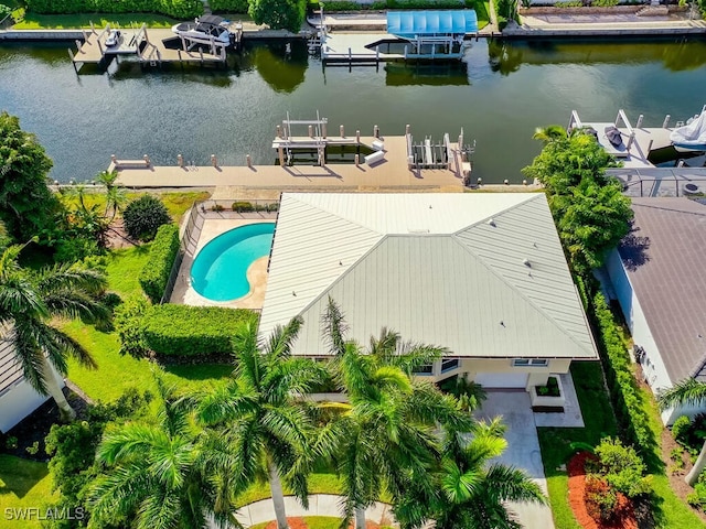 bird's eye view with a water view