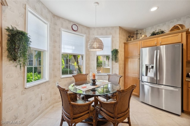 dining room featuring light tile patterned floors