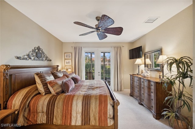 bedroom featuring french doors, ceiling fan, access to outside, and light colored carpet