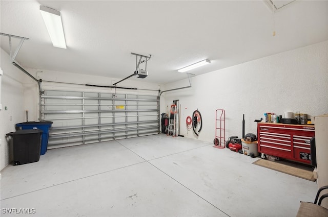 garage featuring a garage door opener