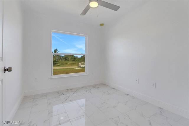 unfurnished room with ceiling fan