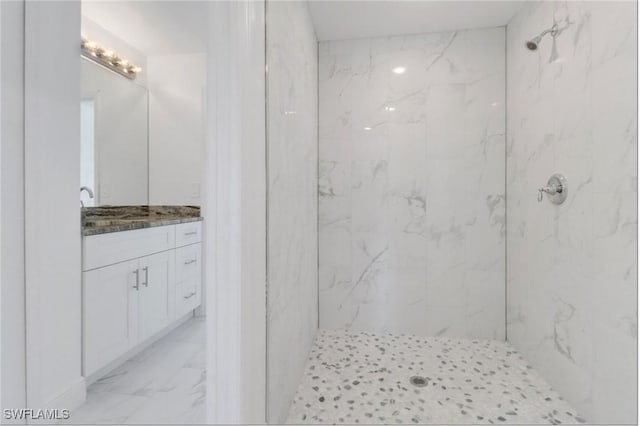 381 Paulcrest Ave, Lehigh Acres, FL 33974 - bathroom with marble finish flooring, a marble finish shower, and vanity
