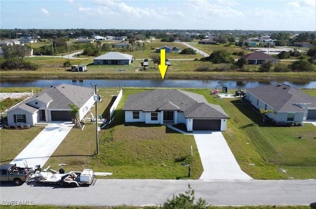 381 Paulcrest Ave, Lehigh Acres, FL 33974 - aerial view of residential area featuring a large body of water