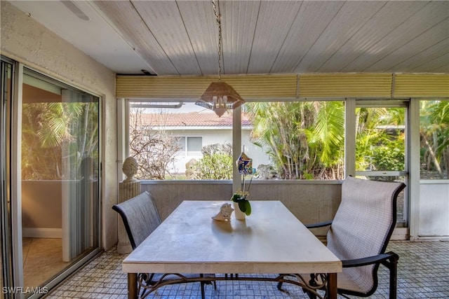 sunroom / solarium with wood ceiling