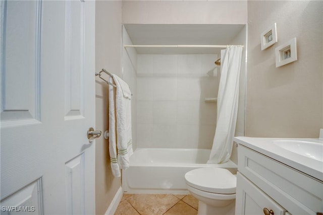 full bathroom featuring shower / tub combo with curtain, vanity, toilet, and tile patterned flooring