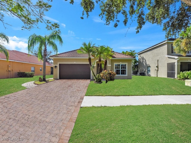 view of front facade featuring a garage and a front yard