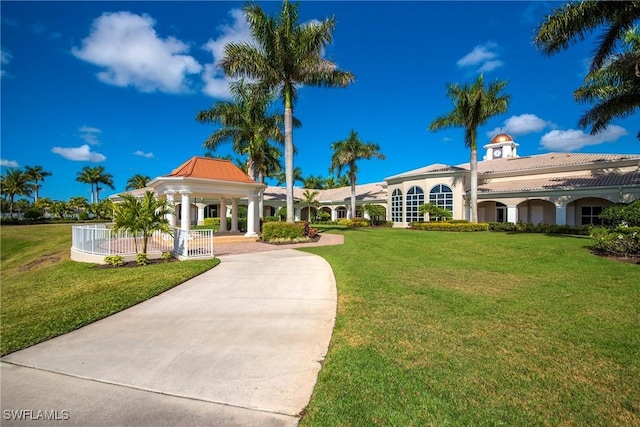 view of home's community with a lawn