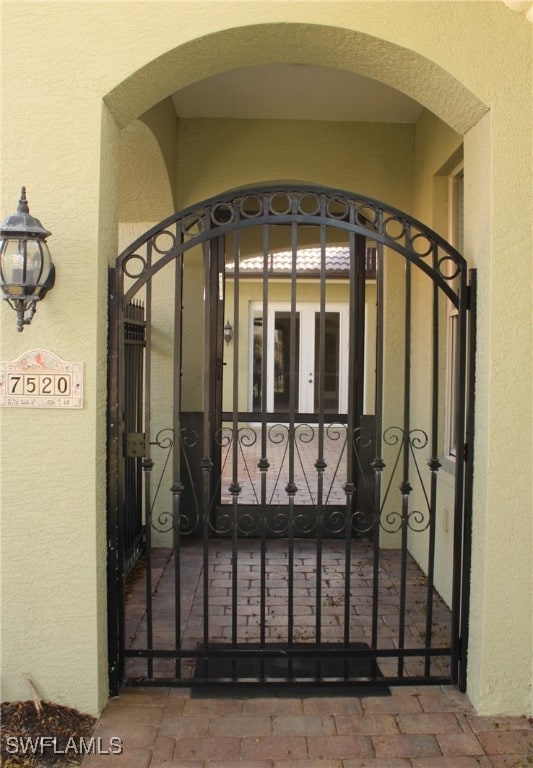 view of gate with french doors