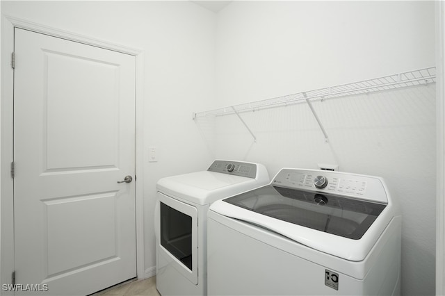 laundry room featuring independent washer and dryer