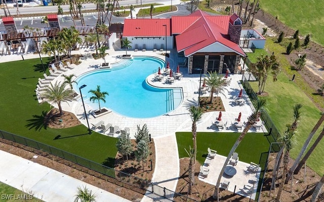 view of swimming pool featuring a patio area