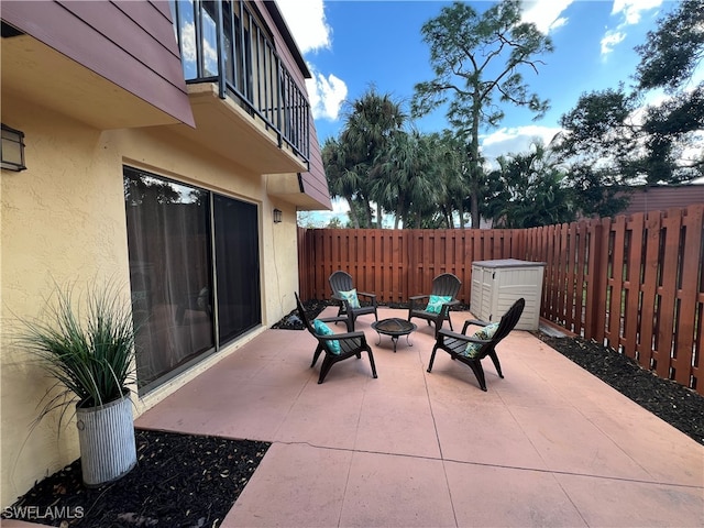 view of patio / terrace featuring a fire pit