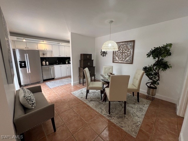 view of tiled dining space