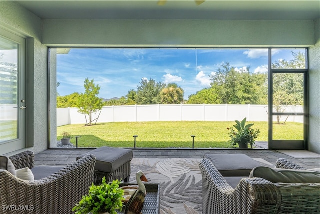 sunroom / solarium with a wealth of natural light