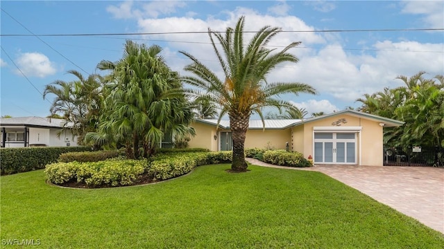 ranch-style house with a front lawn