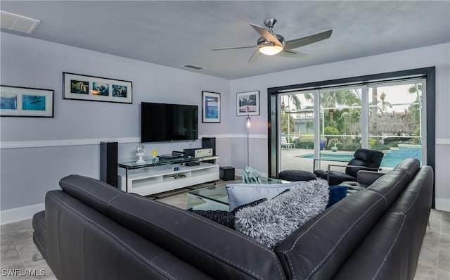 living room featuring ceiling fan