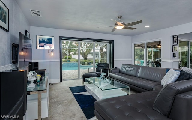 living room with ceiling fan