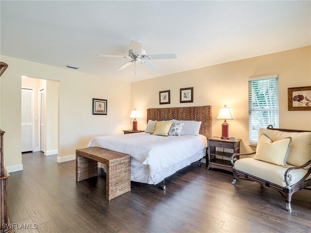 bedroom featuring dark wood-type flooring and ceiling fan