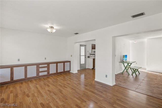 empty room featuring wood-type flooring