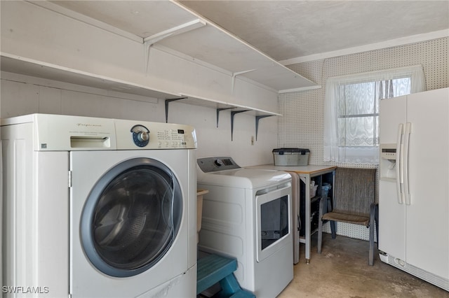 washroom featuring separate washer and dryer