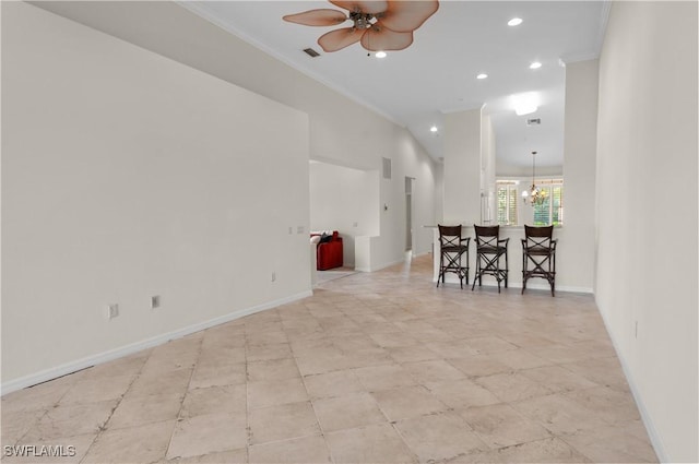 unfurnished room with recessed lighting, a ceiling fan, baseboards, and crown molding