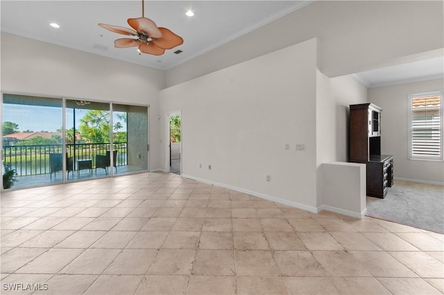 unfurnished room with ceiling fan, baseboards, light tile patterned floors, crown molding, and recessed lighting