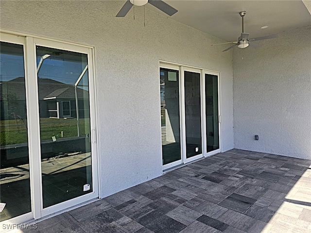 view of patio / terrace with ceiling fan